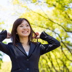 young asisn businesswoman in the park