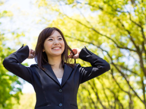 young asisn businesswoman in the park