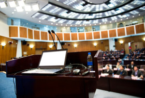 Speaker's table in conference room.